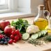 Sélection colorée d’aliments frais et d’un verre d’eau présentés comme choix équilibrés pour la santé des reins.
